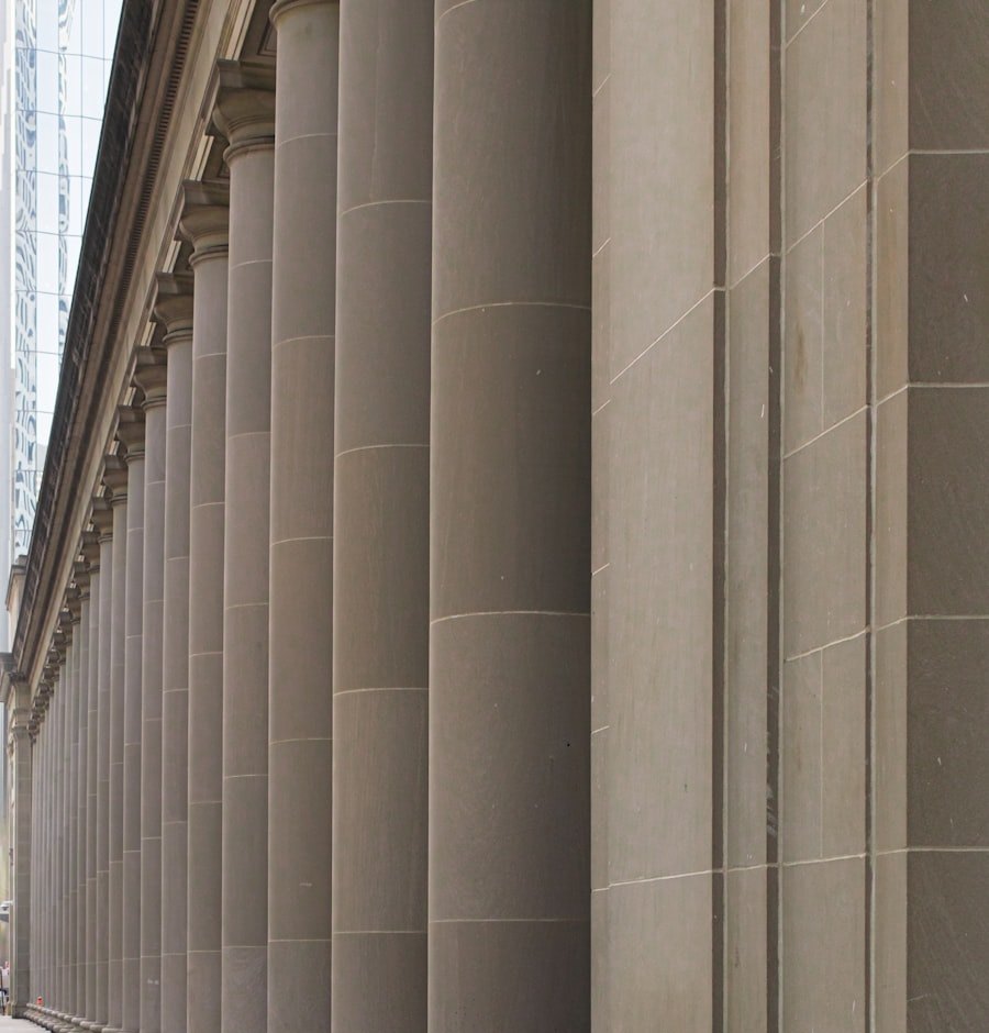Coursed ashlar masonry — dressed limestone columns of a classical facade